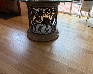 Round Glass Top Dining Table with Ornate Forged Iron Base