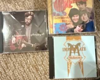 Eric Clapton Unplugged CD, The Monkees Greatest Hits CD, Madonna Immaculate Collection CD