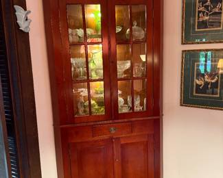 Lighted corner China cabinet. Great shape.