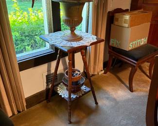 Small side table. Very sturdy.