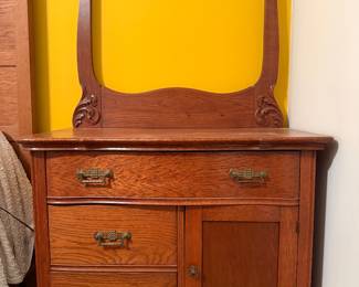 Oak dry sink with towel bar. Very sturdy. Drawers work well.