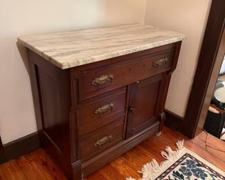 Marble top wash stand. Drawers work well. Very sturdy.