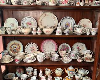China collection. Various cups and saucers, plates, tea pots.