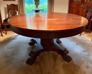 Clawfoot pedestal dining table. Great shape. Very sturdy.