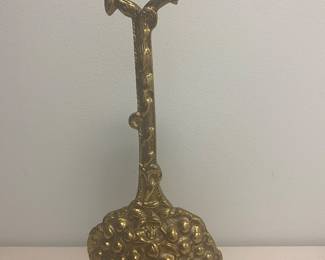 Vintage brass doorstop.