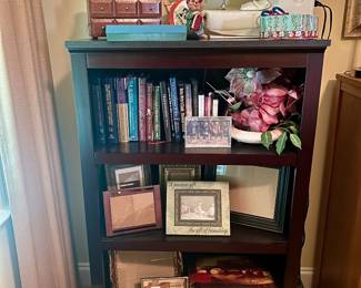 Bookshelf, picture frames, sewing notions & books