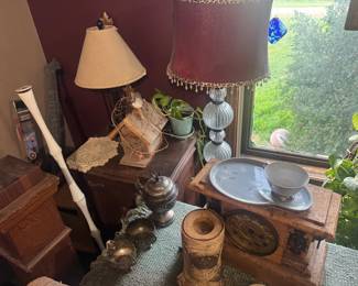Lamps. Mantle clock. Sewing cabinet.