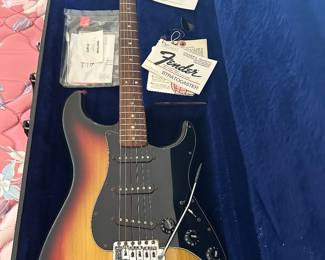 1978 FENDER Stratocaster in Sunburst finish with corrosion on the chrome parts and play wear on the body