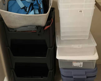 Lot 235: Stackable plastic storage bins with a small rolling cart and bags