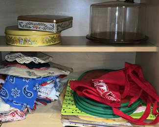 Lot 246: Whitman's Sampler tin, glass cake dome, and textiles