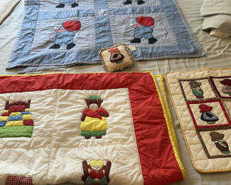 Lot 270: Handmade quilts and decorative pillow with bear appliqué, plus a Playmobil toy box