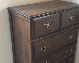 Lot 256: Dark wood tall chest of drawers