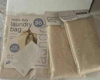 Lot 217: Canvas Laundry Bags and Assorted Fabric and Key Accessories