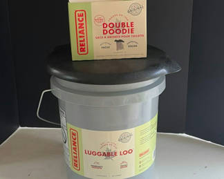 Lot 216: Reliance Luggable Loo Portable Toilet with Double Doodie Waste Bags