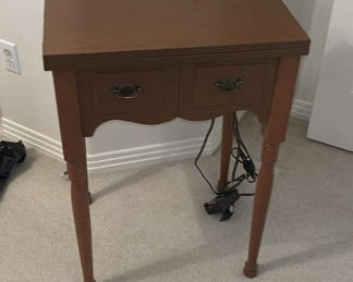 Lot 61: Singer Sewing Machine in Wooden Cabinet Table