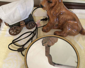 Lot 120: Ceramic Dog Figurine Lamp, Covered Wagon Lamp, and Oval Mirror