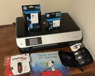 Lot 239: HP Envy 5530 printer with ink cartridges and USB storage devices