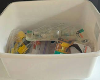 Lot 209: Plastic Storage Bin with Assorted Light Bulbs and Accessories