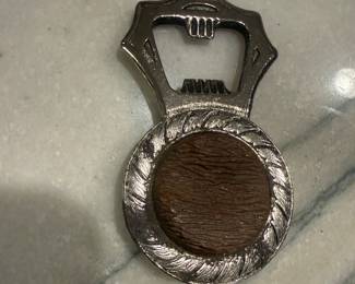Item 75 Bottle opener finish shows patina $10