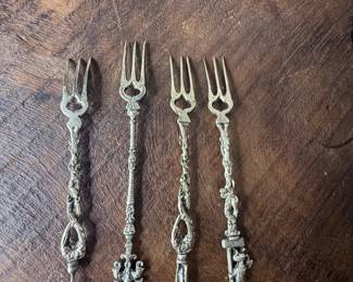 Item 77  Unmarked set 4 forks $30set 