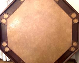 Gaming table with folding legs