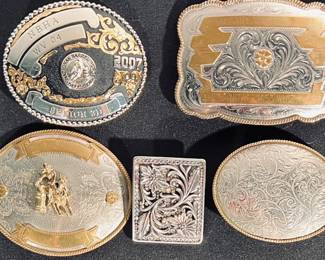 4 German silver trophy buckles and ladies floral engraved buckle