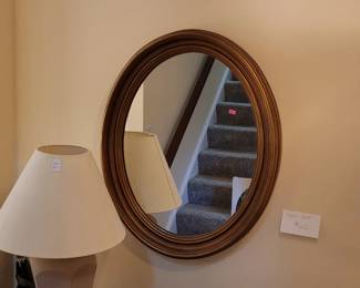 Oval wall mirror