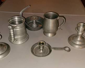 Pewter mugs and candle holders