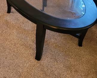 Oval glass top table