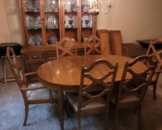 Dining room table with two leaves 44 in wide by 64 long with six chairs and Hutch 70 in wide by 19 inches deep by 80 in tall.