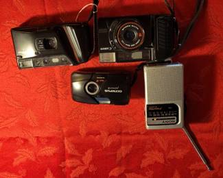 Olympus Stylus Epic 35 mm camera, Canon Sure shot, Nikon funtouch camera Sony transistor radio