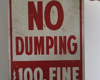 Metal No Dumping sign