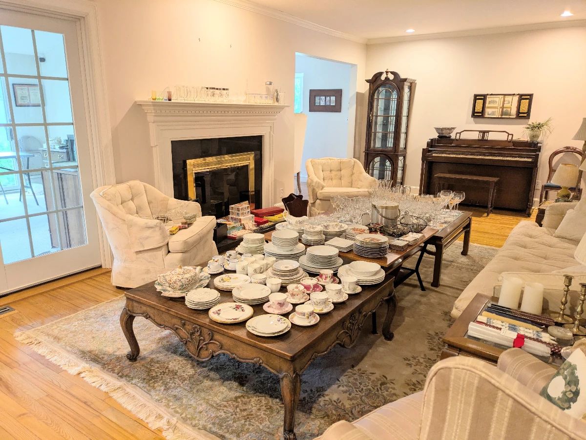 Living Room with Dishes, Piano, Chairs, and Couch