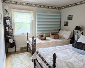 Two Twin Beds, Baskets, and Decorative Items