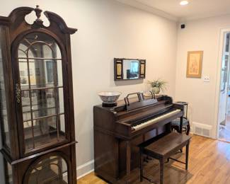 Upright Piano and Glass Display Case