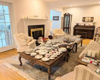 Living Room with Dishes, Piano, Chairs, and Couch