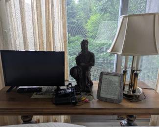 Television, Statue, and Table