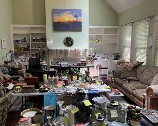 view of main room with glass vases, dishes, pitchers, ceramic figurines, jewelry