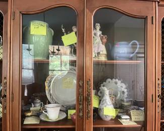 some collectible/vintage dishes and figurines, such as "McCoy Pottery" and "Splendid Music Box Company" music box