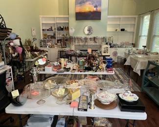 view of main room with glass vases, dishes, pitchers, ceramic figurines, jewelry