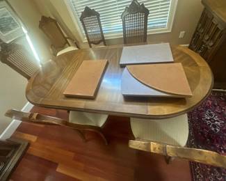 Dining table set with padded covers
