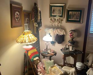 A corner in what we call Lottie's room with lots of old clothes from 1937, including the dress that Lottie has on in her pictures.
