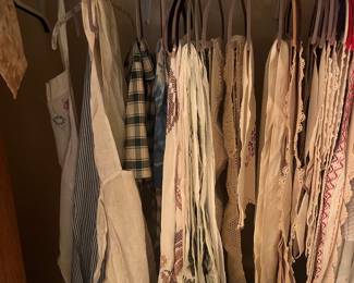 Old aprons, crochet table cloths, and other hand made items.