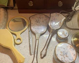 Hand held mirrors.