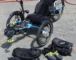 ICE Adventure HD 26 recumbent Trike, featuring a vibrant blue frame and a comfortable Ergo-Luxe mesh seat w/ extra battery, shoes, bag, etc. Lightly used in Great Condition..