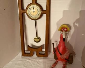 Unbranded Wall Hanging Pendulum Clock And A Wooden Flamingo