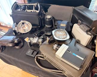 canon camera and lens, sigma lens, camera cases, cds, portable cd players, vintage cameras