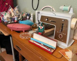 Craft room: vintage sewing and stitching, mid-century Singer machine