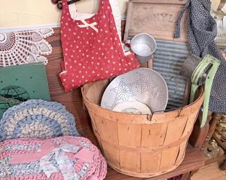washboard, baskets aprons, placemats, masher