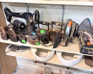 1910 Singer sewing machine, scales, old irons and enameled bed pans